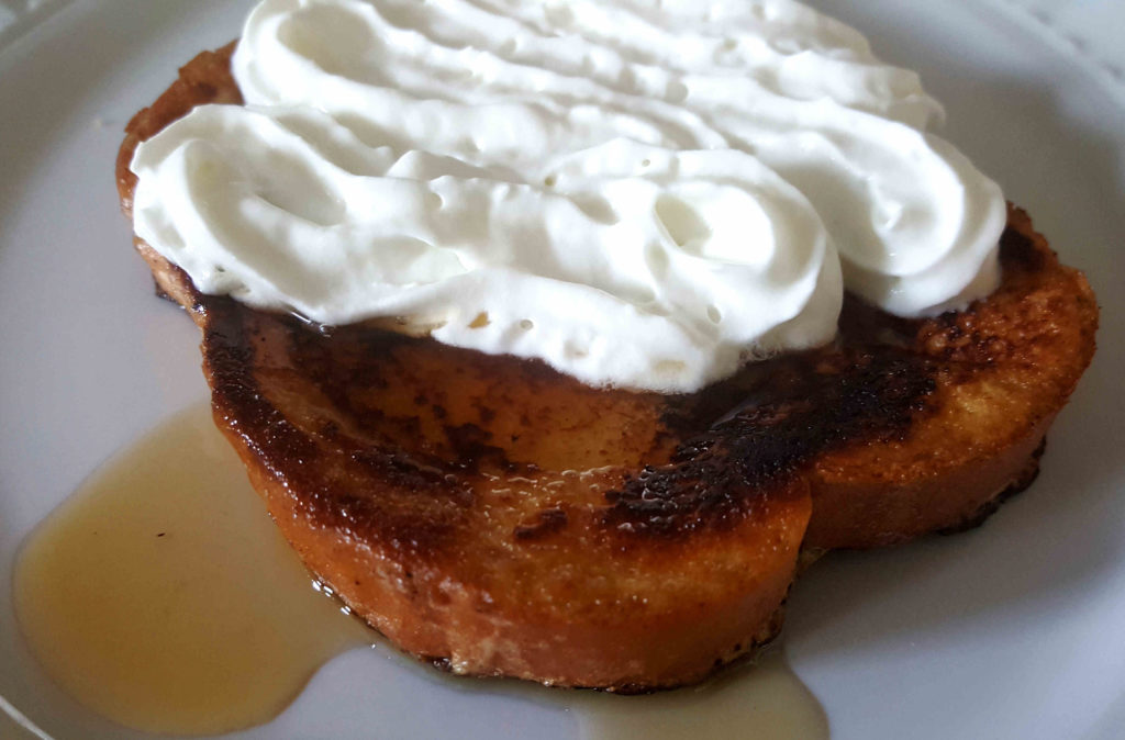 French toast with cream and syrup